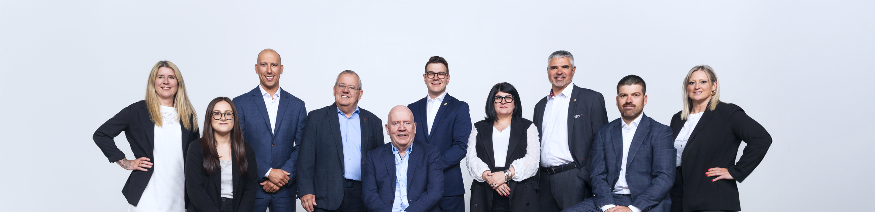 A group shot of The Colbert Group.