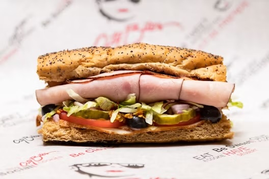 Dressed with lettuce, tomatoes, red onions, pickles, black olives, crushed cherry peppers, blended oils, mayo, salt & pepper