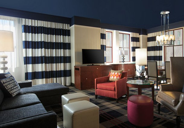 This suite features two flat screen televisions, separate living area, wet bar, free wireless internet, and plenty of seating to host guests.