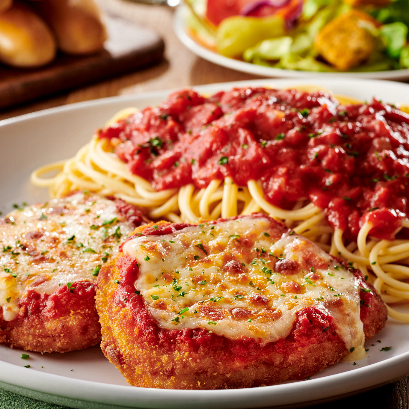 Chicken Parmigiana: A classic with our homemade marinara and a side of spaghetti. Olive Garden Italian Restaurant Folsom (916)984-7036