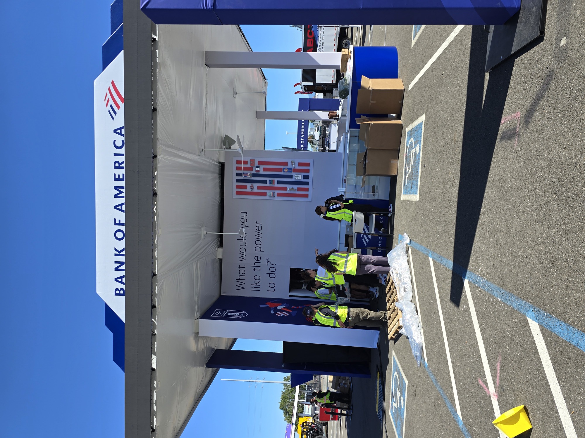 Bank of America branded entrance arch flanked by interactive digital kiosks, creating a welcoming entry point to the FIFA World Cup activation.