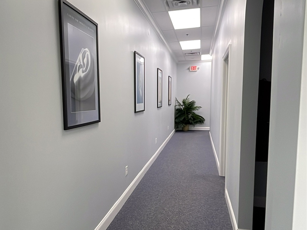 Interior photo of the hallway for AudioNova hearing clinic in Port St. Lucie, FL