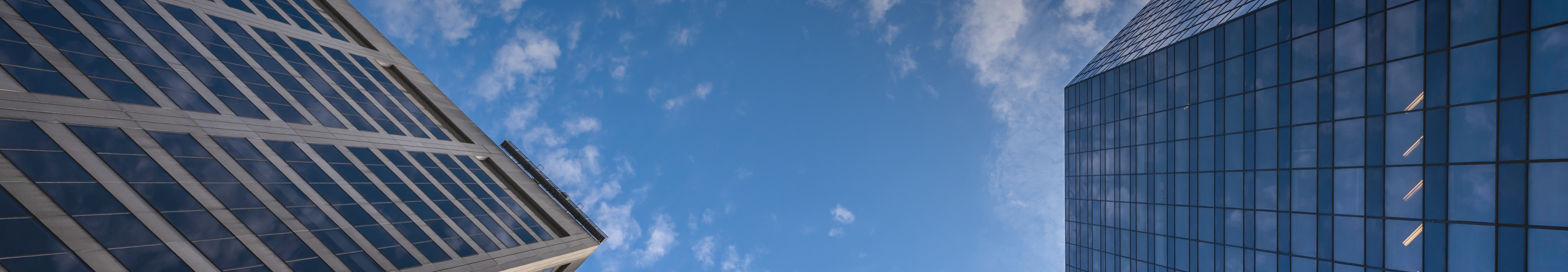 Buildings in Montreal and the sky as seen from below.