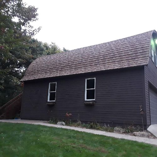 This beautiful Fall Barn Cottage Shake Metal Overlay completed this look! We service Minneapolis, St. Paul and the surrounding suburbs, as well as Iowa, Wisconsin, North Dakota and South Dakota. Give us a call for a free estimate!