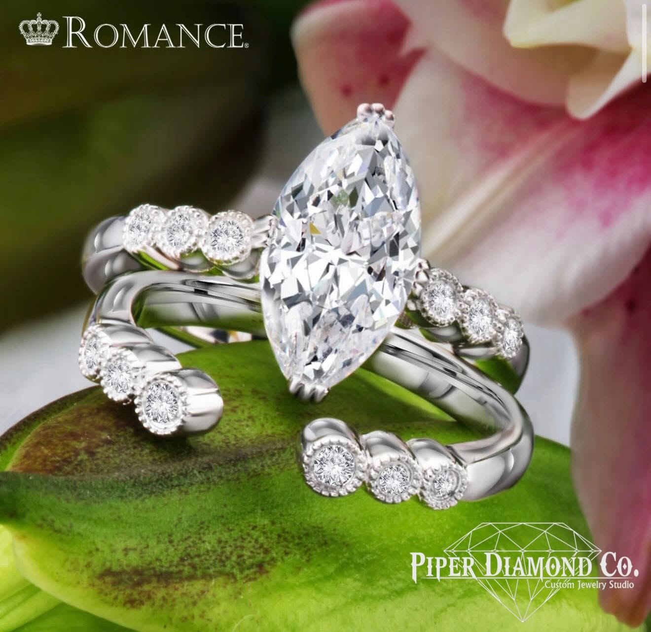 Romance marquise diamond engagement ring with a matching white gold diamond wedding band set. Elegant bridal jewelry featuring brilliant diamonds for a timeless and unforgettable proposal.