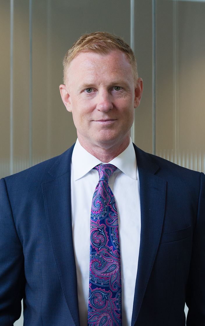 Evan Howard headshot.