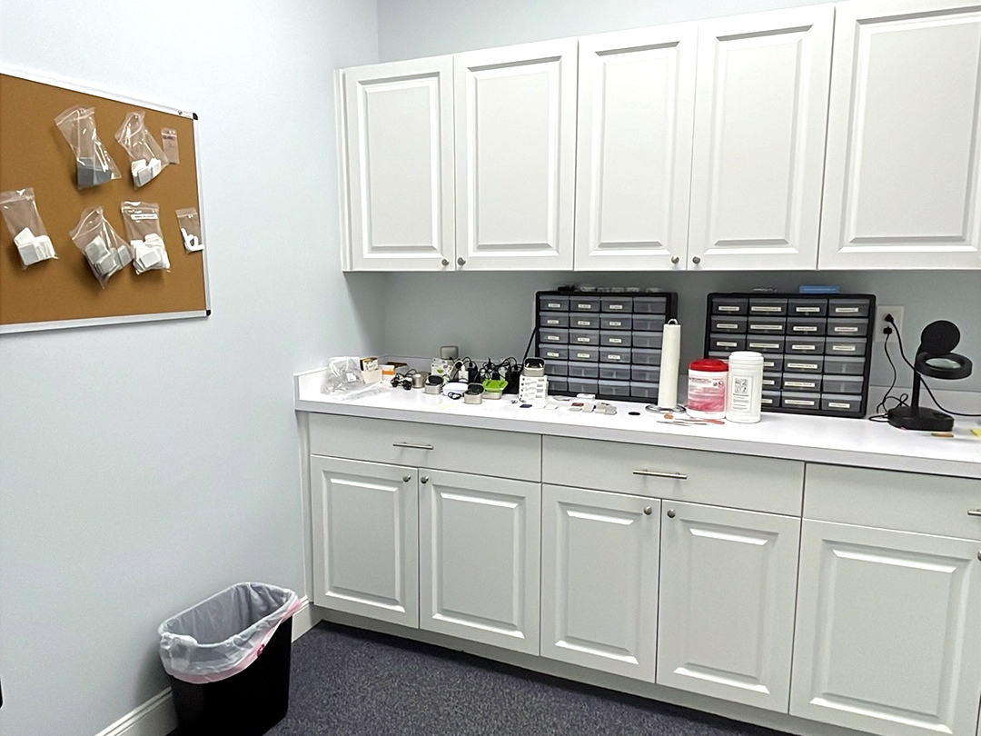 Interior photo of the hearing aid lab area for AudioNova hearing clinic in Port St. Lucie, FL