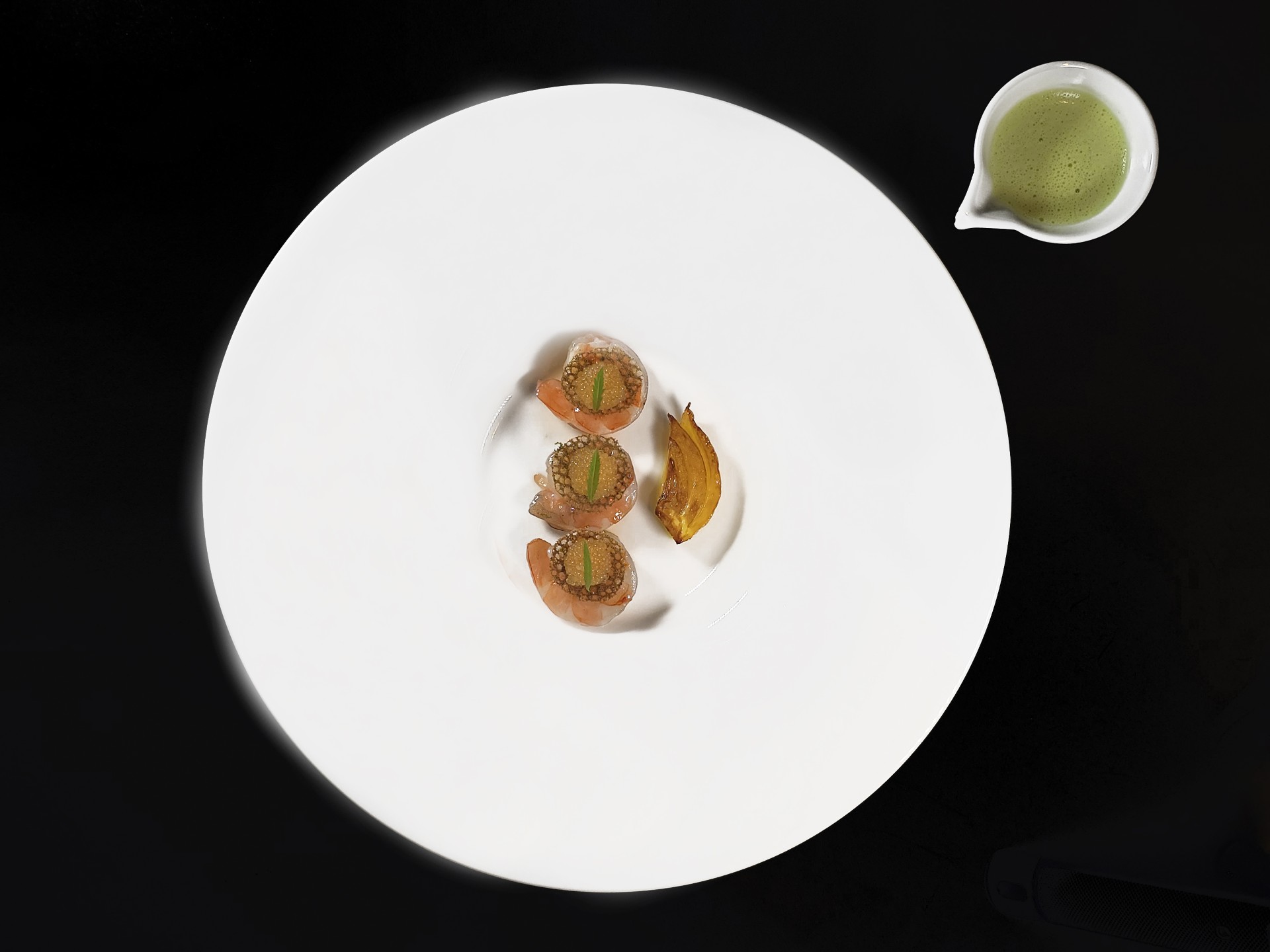 Blue prawns served with pike roe, genmaicha tuile and a dill and chive bouillon. A course on the Discovery and Pre Theatre menus at Essential by Christophe.