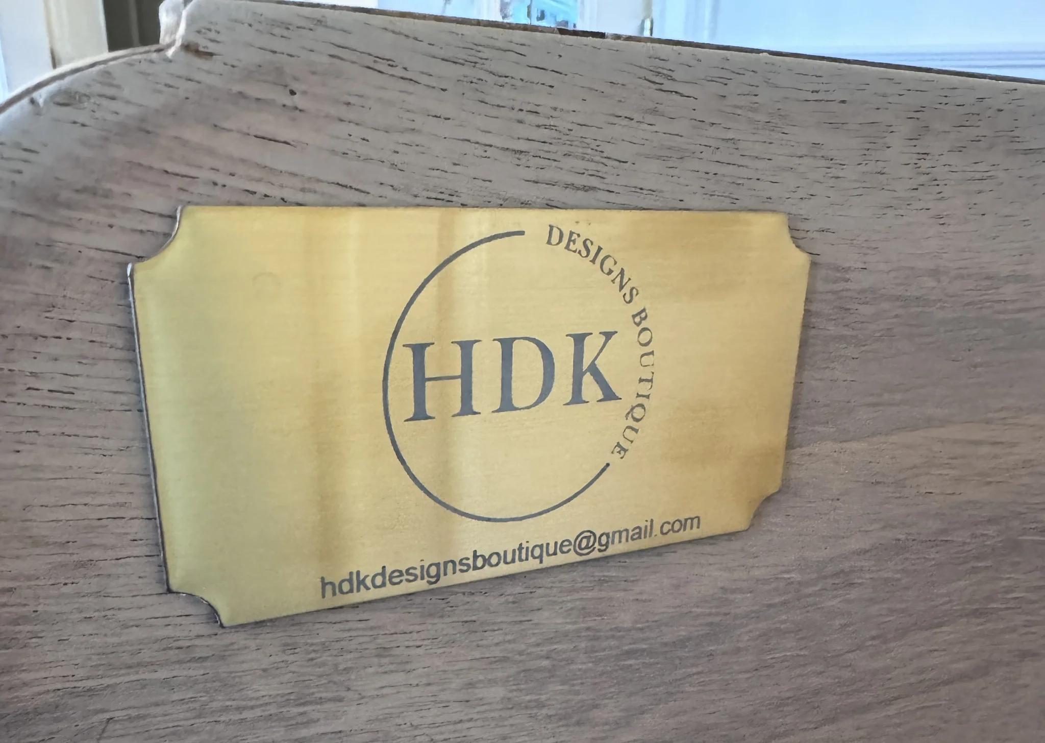 Custom laser print on brass for application to completed works