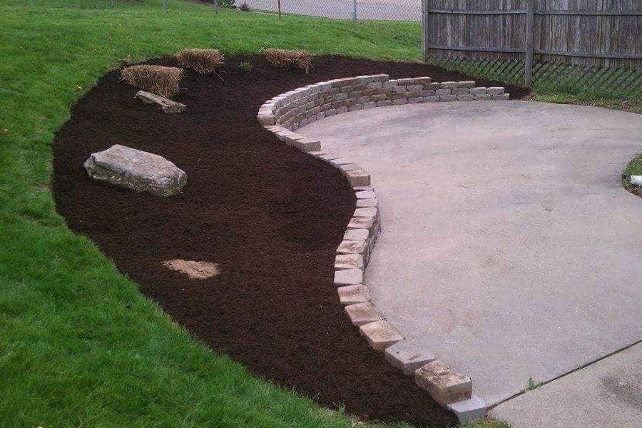 K & R Landscaping provides retaining wall and paver patio installation.