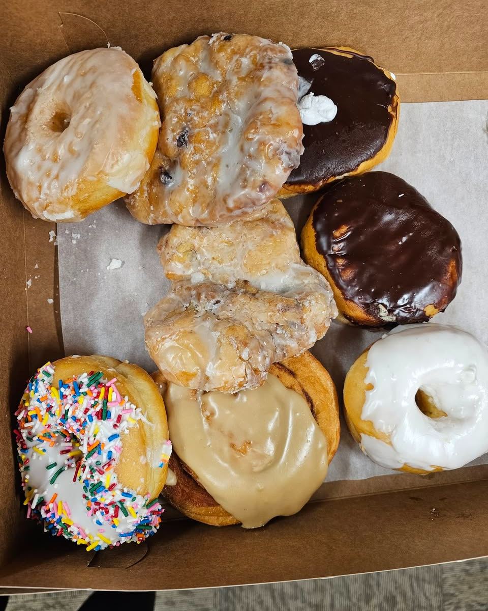 Happy Friday and Happy National Donut Day. Dan is trying to decide between a healthy banana and a sweet donut. We say Fridays are for enjoying the donut. Which would you choose?