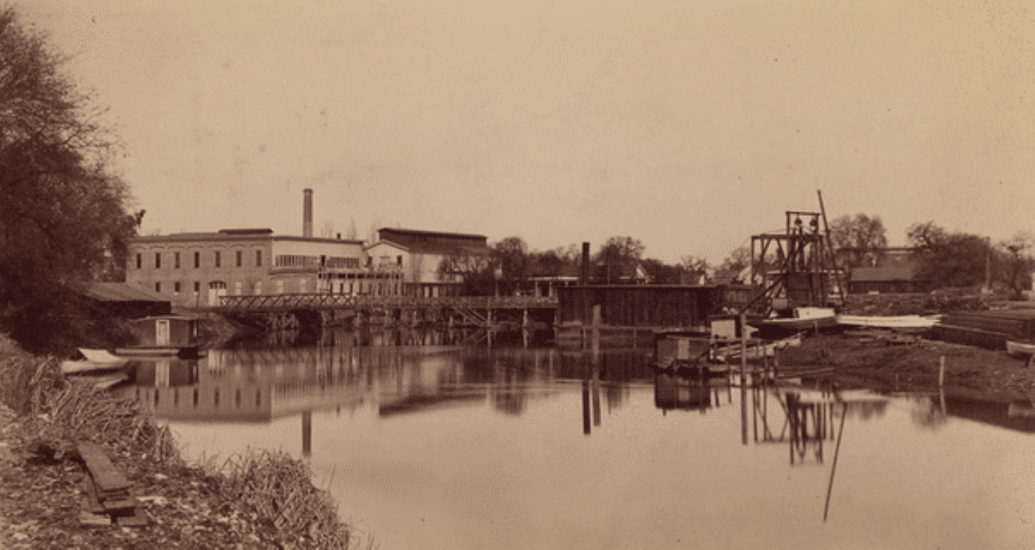 Pacific Leather Tannery building and El Dorado Street drawbridge in the late 1800s