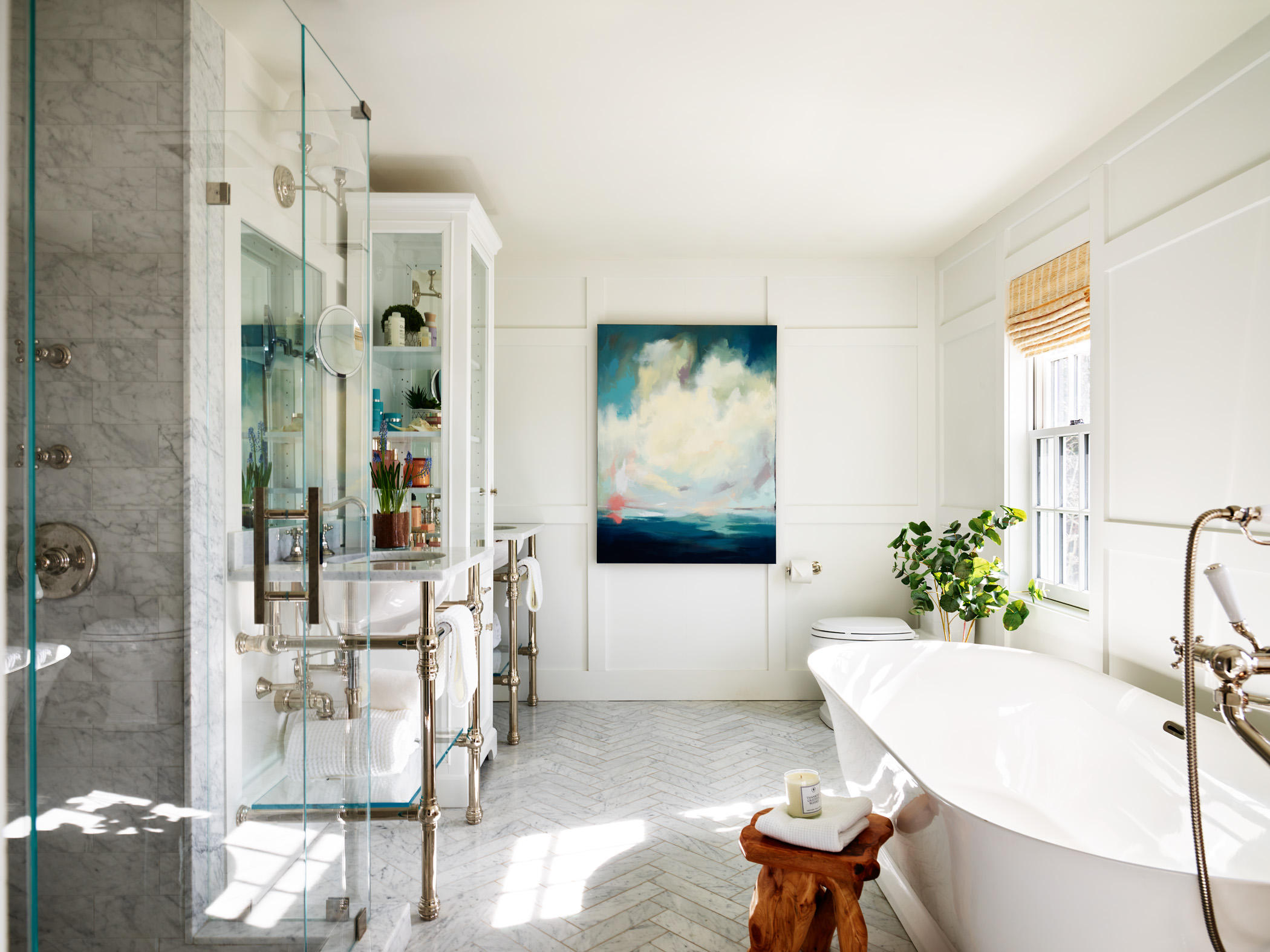 Timeless Carrara Marble Bathroom with British fixtures, soaking tub and Walk-in Shower