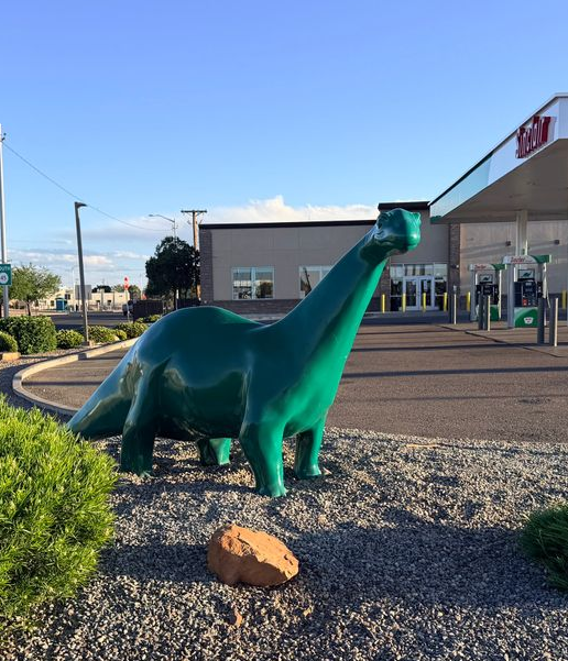 Sinclair gas station fueling island and DINO statue 