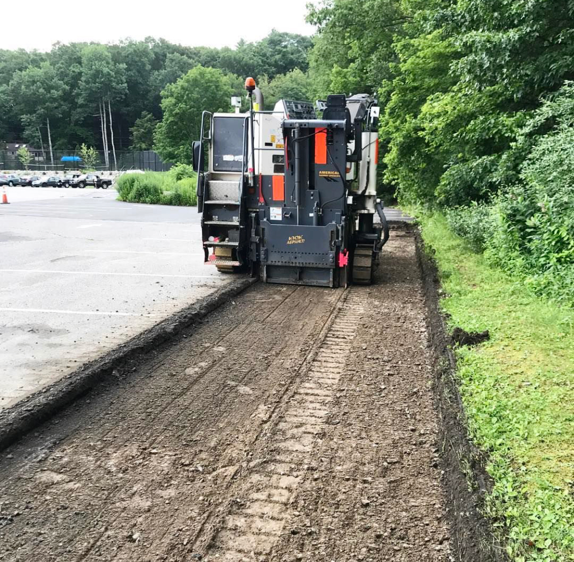 Asphalt milling in action, preparing the surface for durable, long-lasting paving.