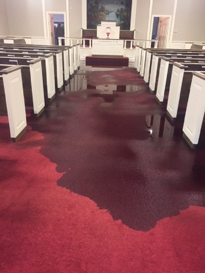 Responding to a severe water loss in a church after a flood.