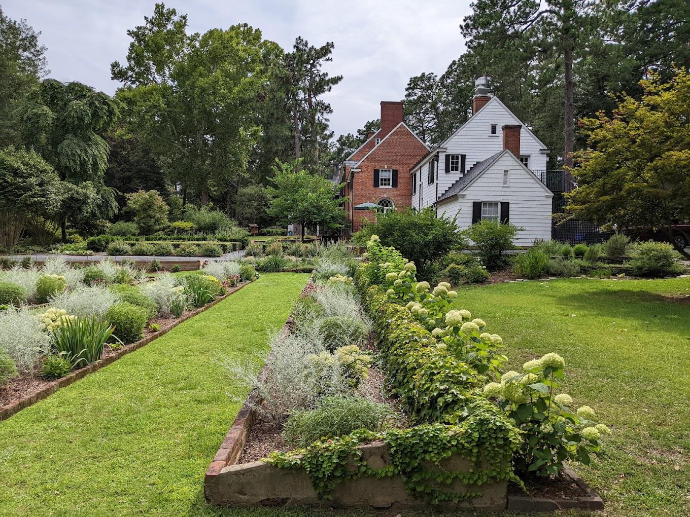 The surrounding 26-acre estate is open to the public for use as a natural preserve and park, with formal gardens designed by Alfred Yeomans, and is the gateway to the longleaf pine forest in the Boyd Tract of Weymouth Woods.