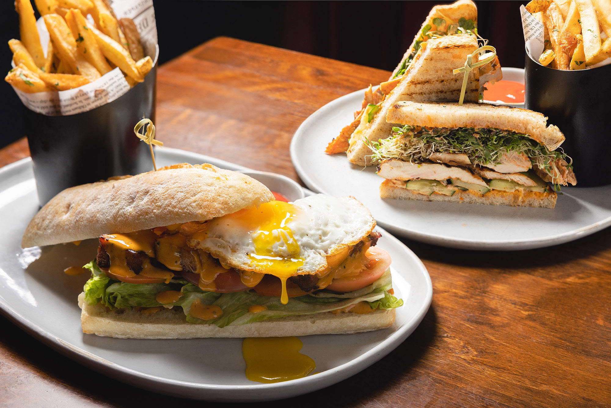 The Independent's Smoked Pork Belly BLT and Grilled Chicken Club are perfect for lunch in Midtown Manhattan