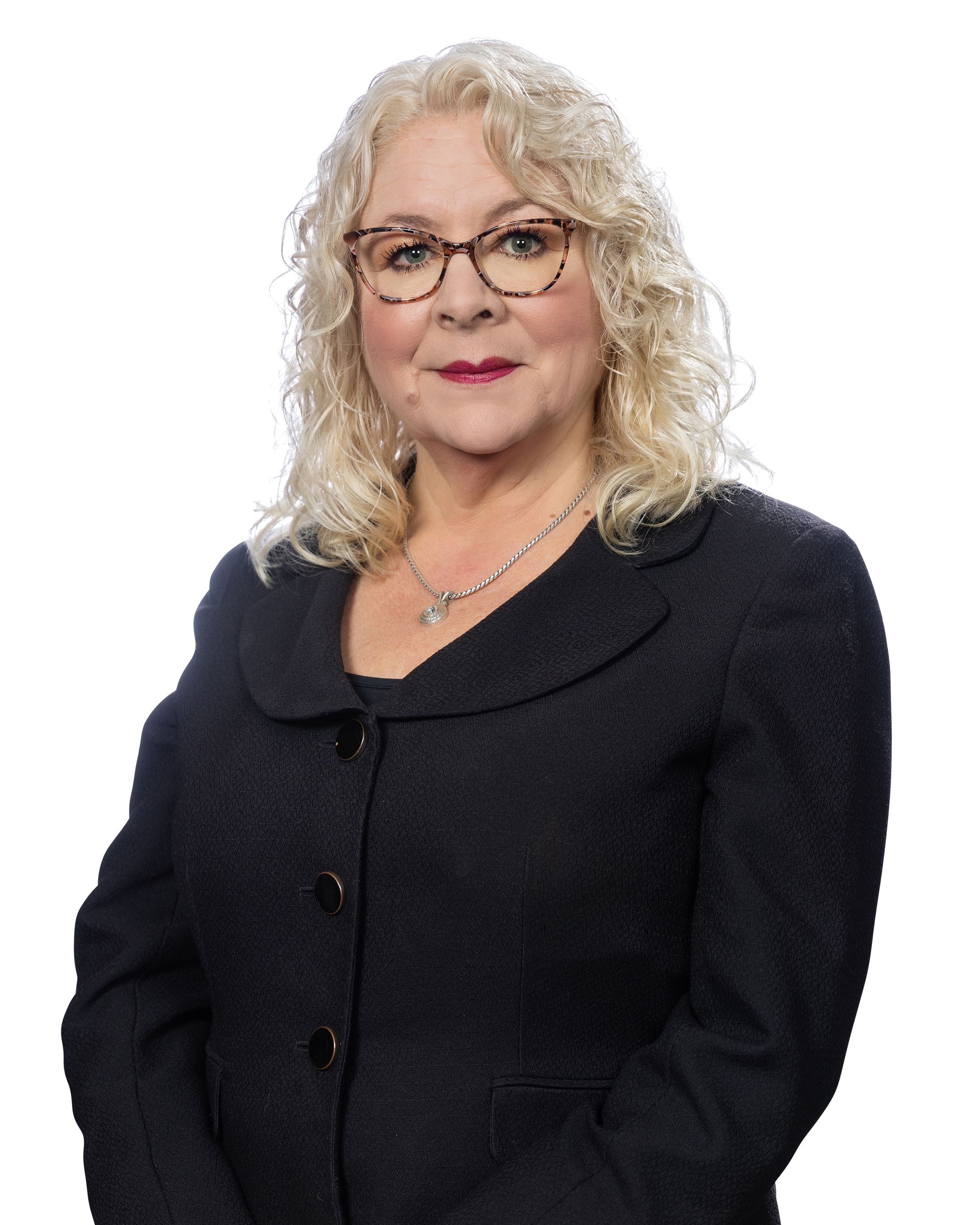 Jennifer Sharp Scully, managing partner and funeral director, manages Sharp's Flint (Grand Blanc Township) location