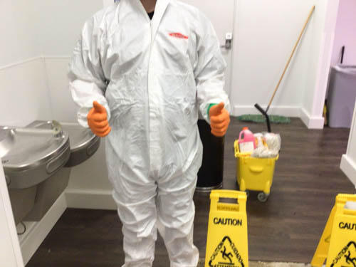 Our professional cleaning services have us suited up in PPE equipment!