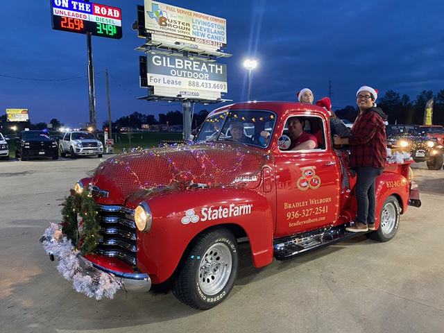Annual Christmas Parade in our little red truck!