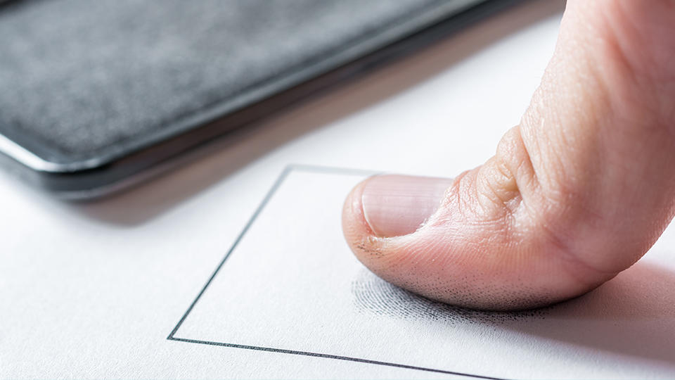 fingerprint being applied to card