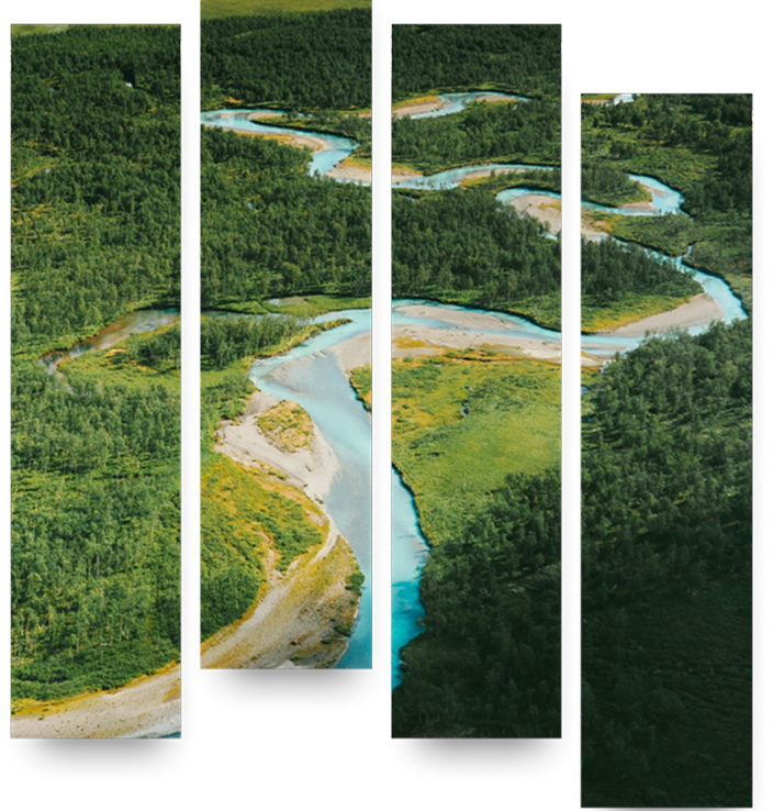 A stunning turquoise river winding through a tree-dense landscape.