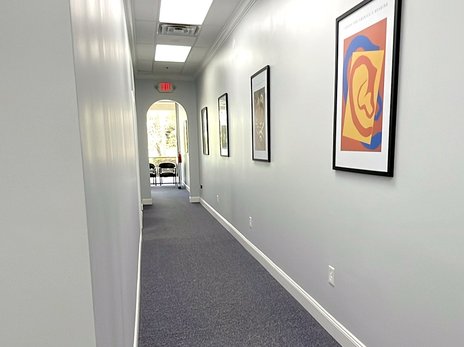Interior photo of the hallway for AudioNova hearing clinic in Port St. Lucie, FL