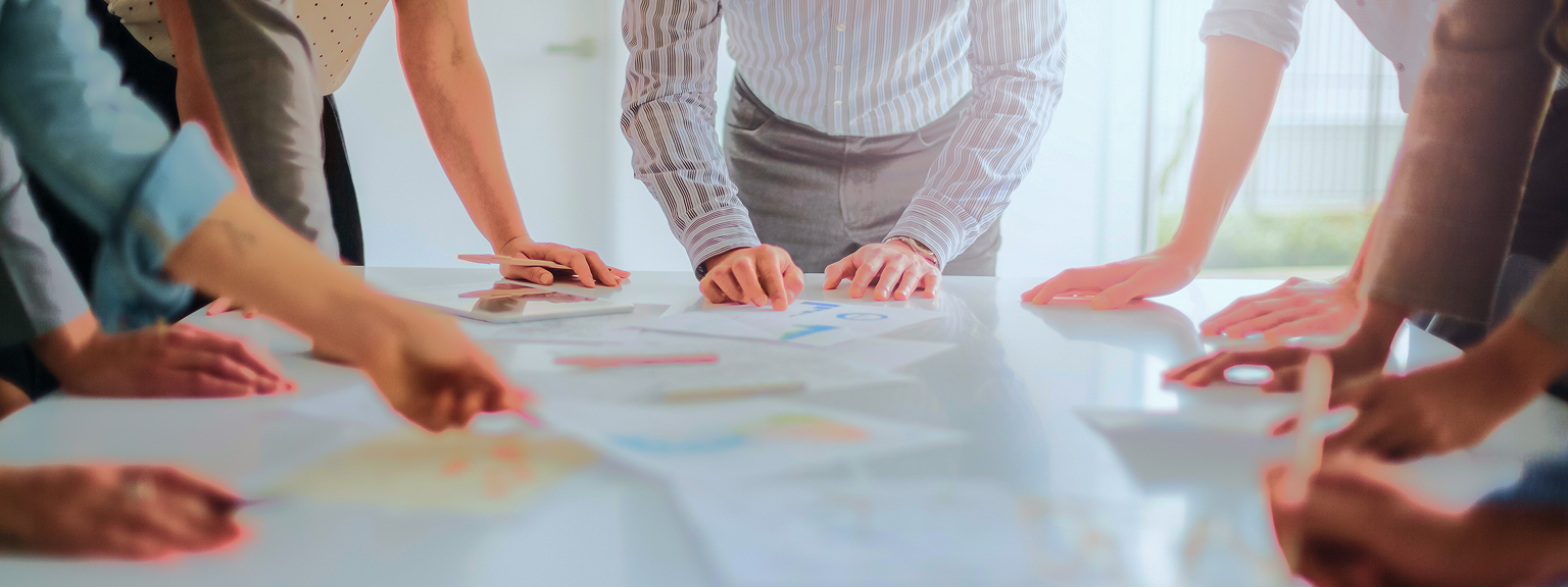 A group of financial professionals collaborating.