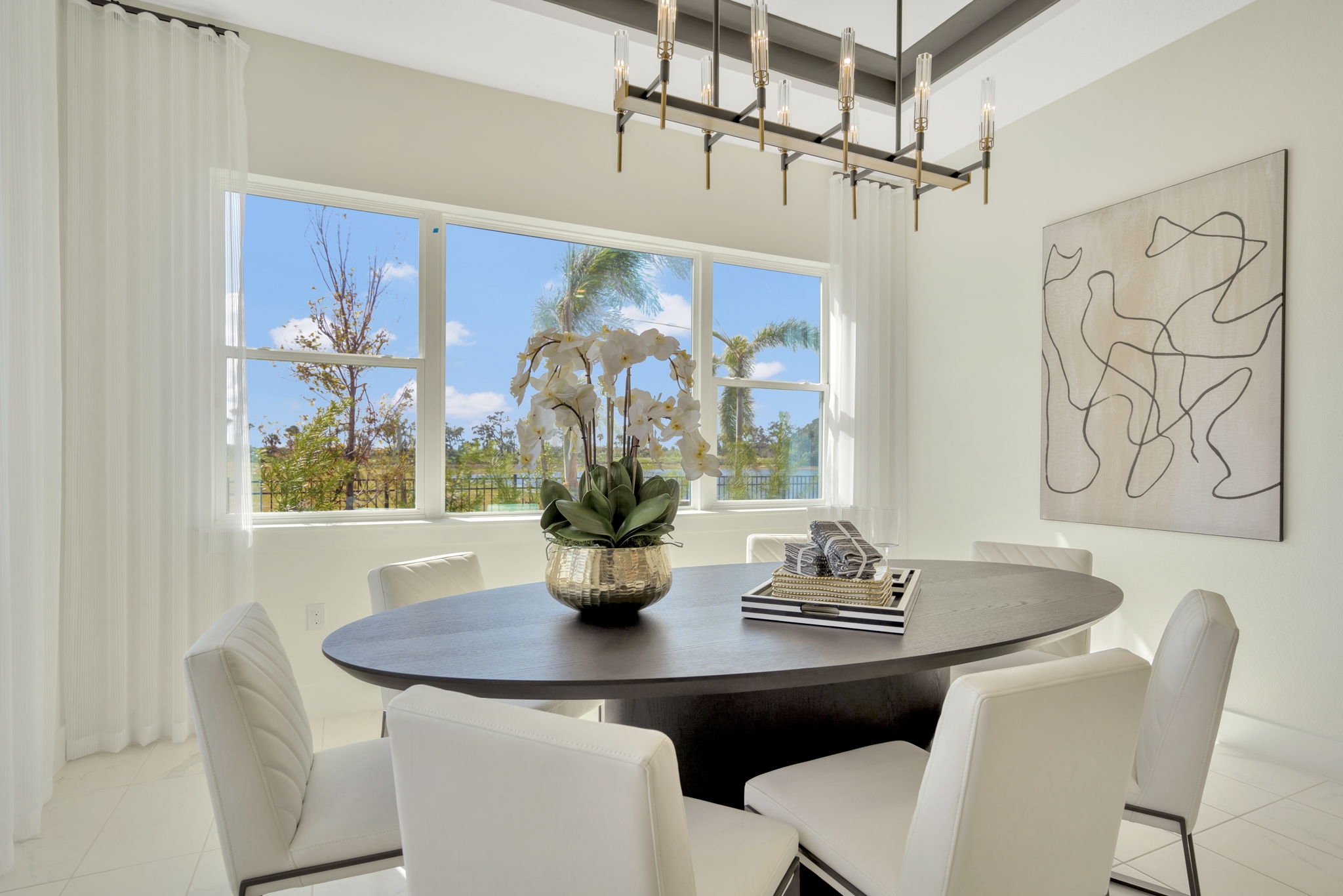 The Dining Room of a DRB Homes Eider Home Plan at Biscayne Landing at Seaire in Parrish, FL.