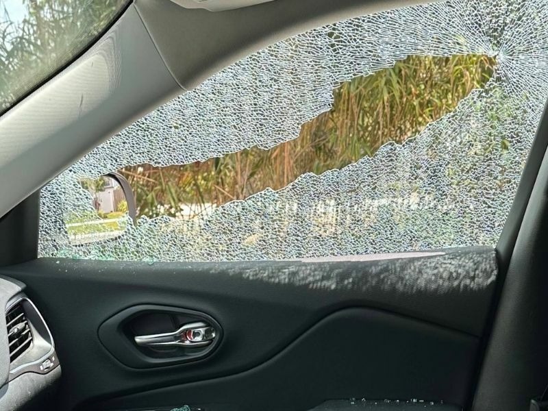 Shattered passenger door glass.