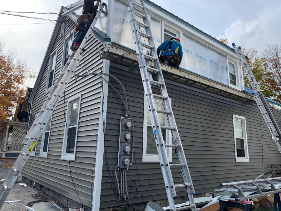 Our handymen renovated this home in Concord, NH with new siding and trim.