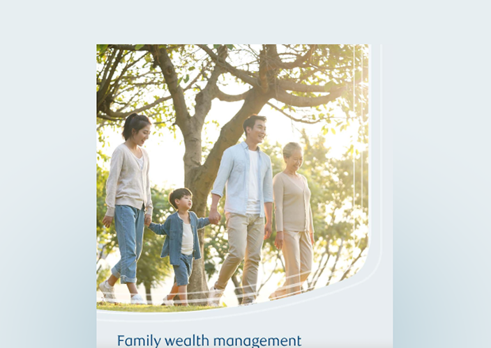Cover of the family wealth guide with a multigenerational family.