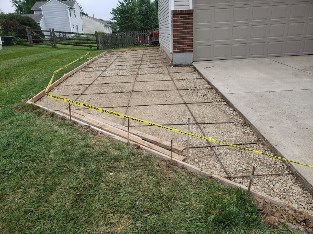 We reenforce every concrete driveway project we do with rebar to add strength and prevent cracking, as you can see in this photo from a Montgomery, Ohio job. We also try to minimize the negative impact on the home's yard so you're not stuck with dead grass afterwards. Do you need extra parking at your home? Call us today and we can discuss your project.