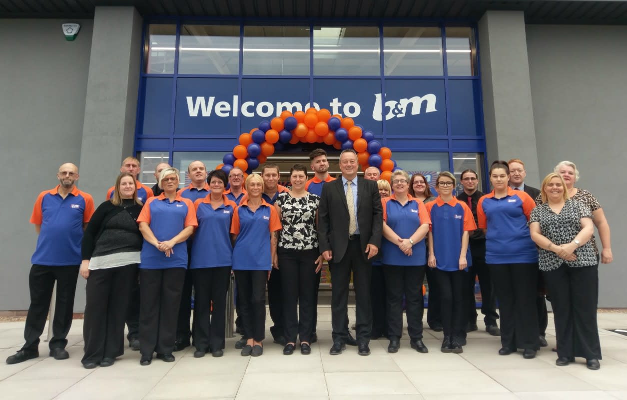 The store team pose in front of their recently refurbished B&M store in Belper.