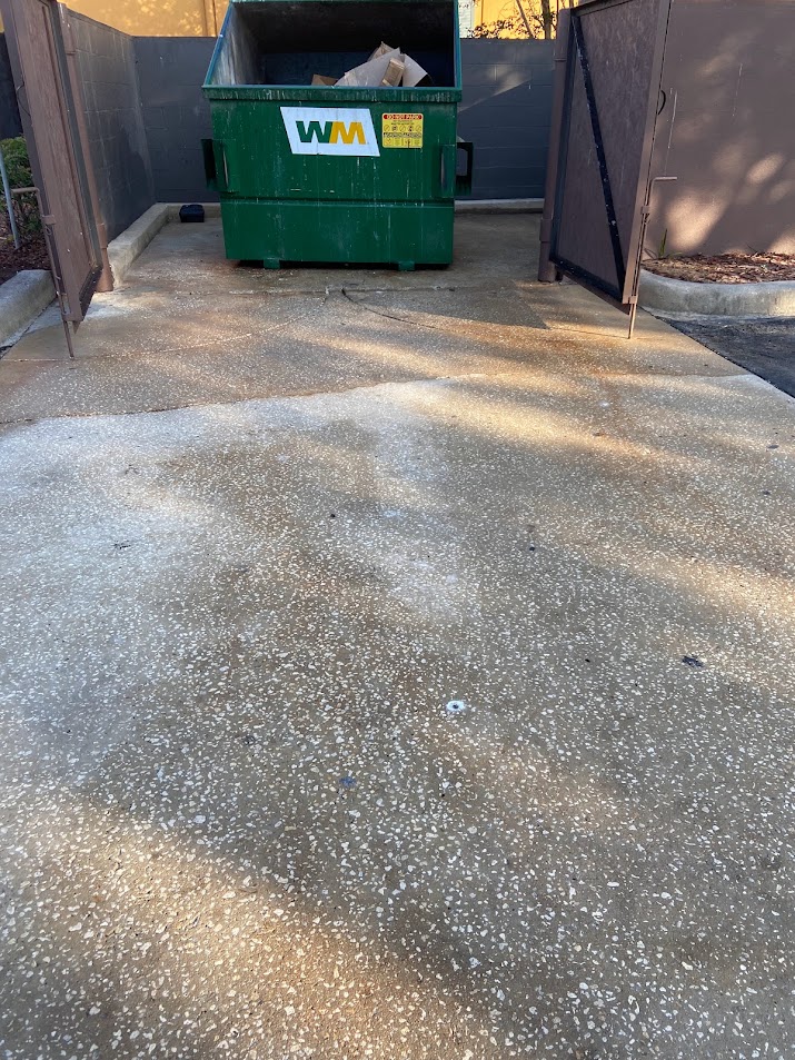 Professional dumpster pad cleaning in Kissimmee, FL for restaurants, businesses, and commercial properties. R & R Elite Pressure Washing removes grease, grime, dirt, and buildup to help maintain a cleaner exterior area.