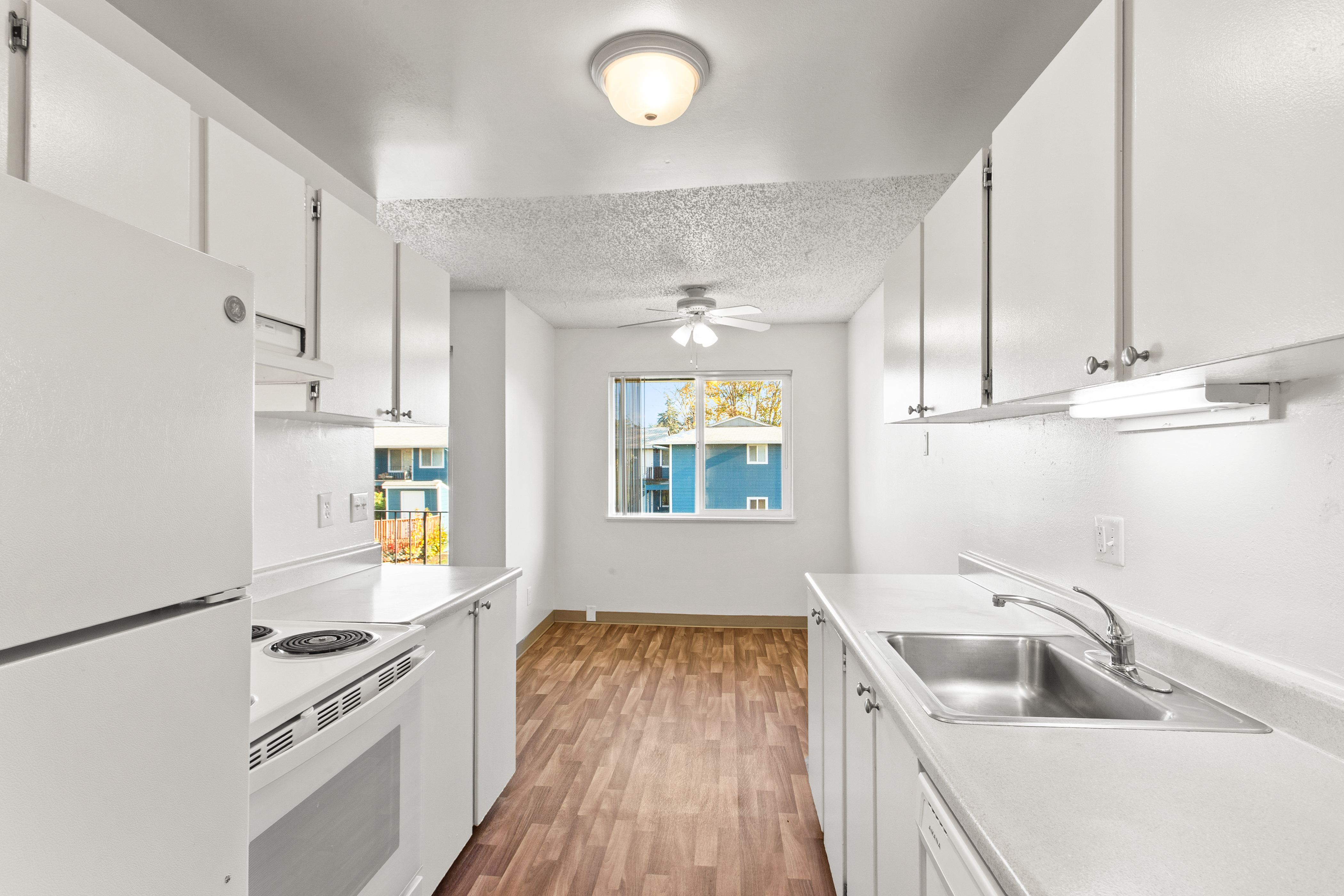 Kitchen with white appliances