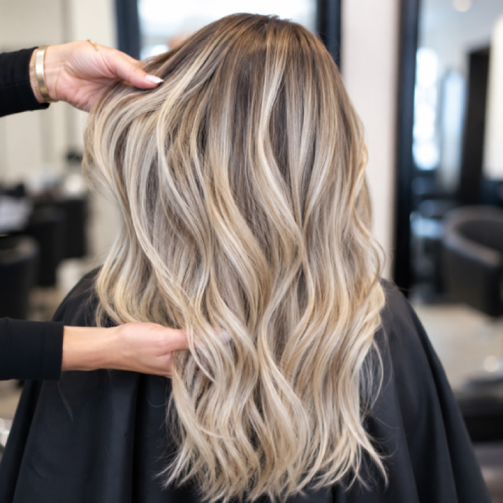Expert blonding and platinum blonde hair color by the professional color specialists at Avissa Salon 