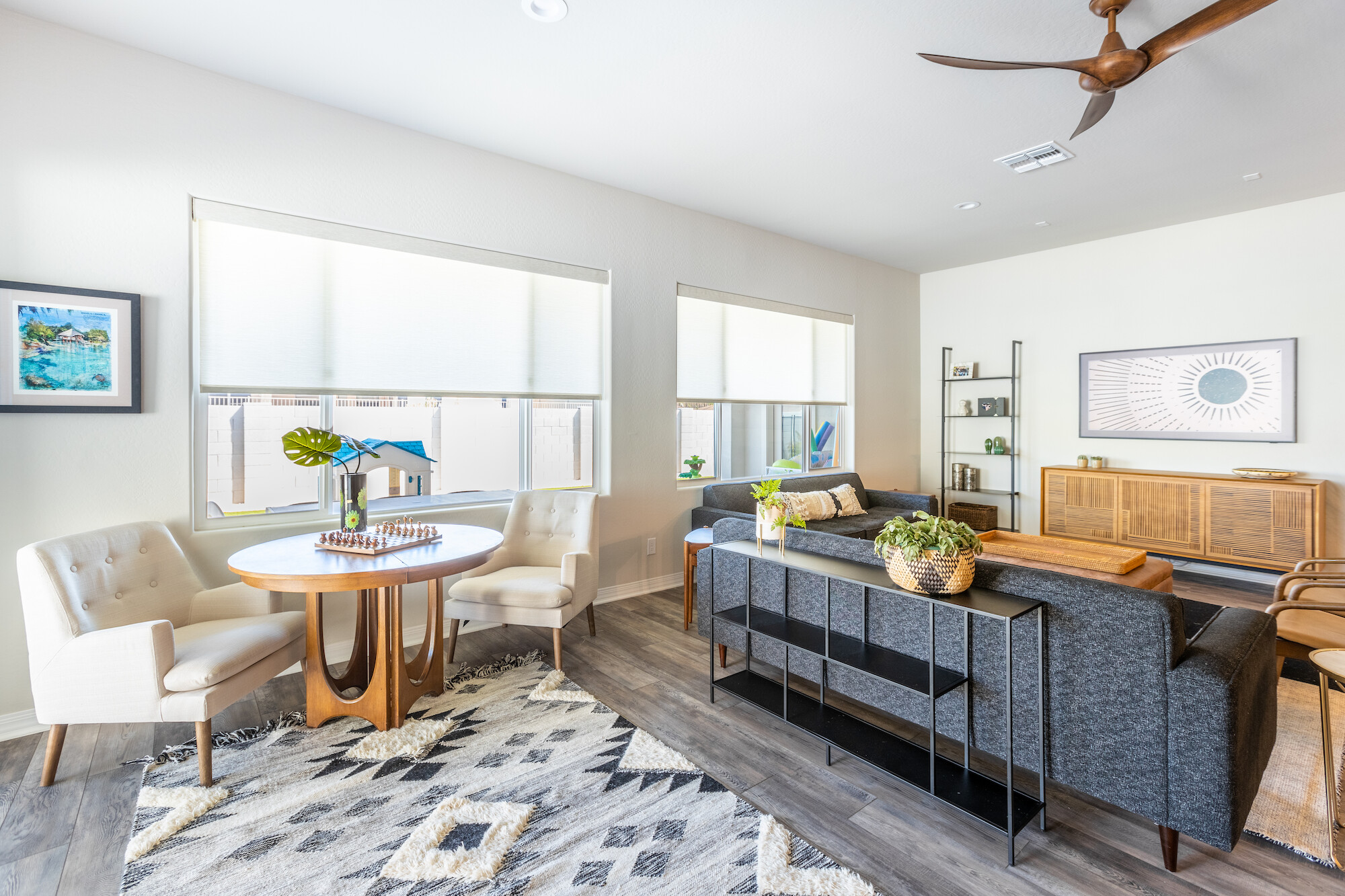 Roller shades do a wonderful job at illuminating any space. Enjoy time with family in your Rockledge living room with soft light filtering through, and adjustable privacy.