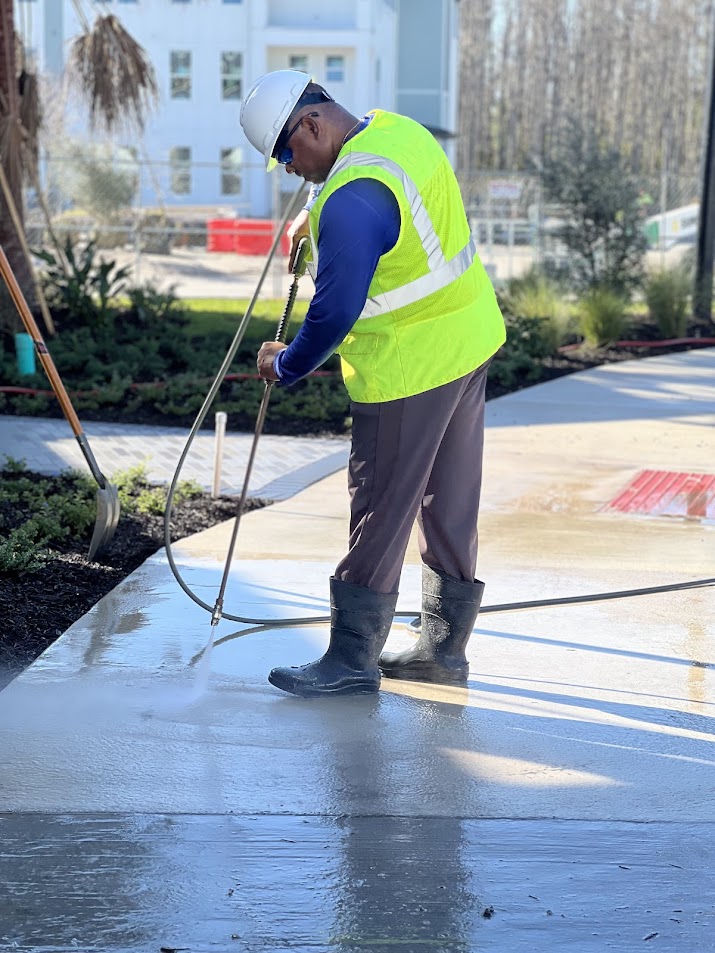 Professional new construction pressure washing by R&R Elite removes dirt, dust, mud, concrete residue, and construction debris, leaving driveways, sidewalks, and exterior surfaces clean and ready for handover.