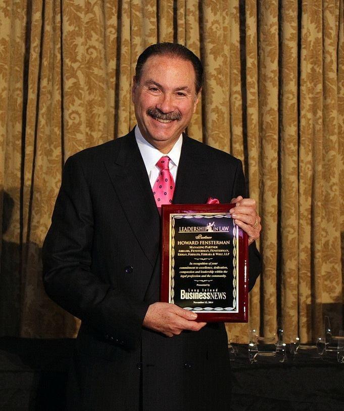 Howard receives Leadership Award from Long Island Business News