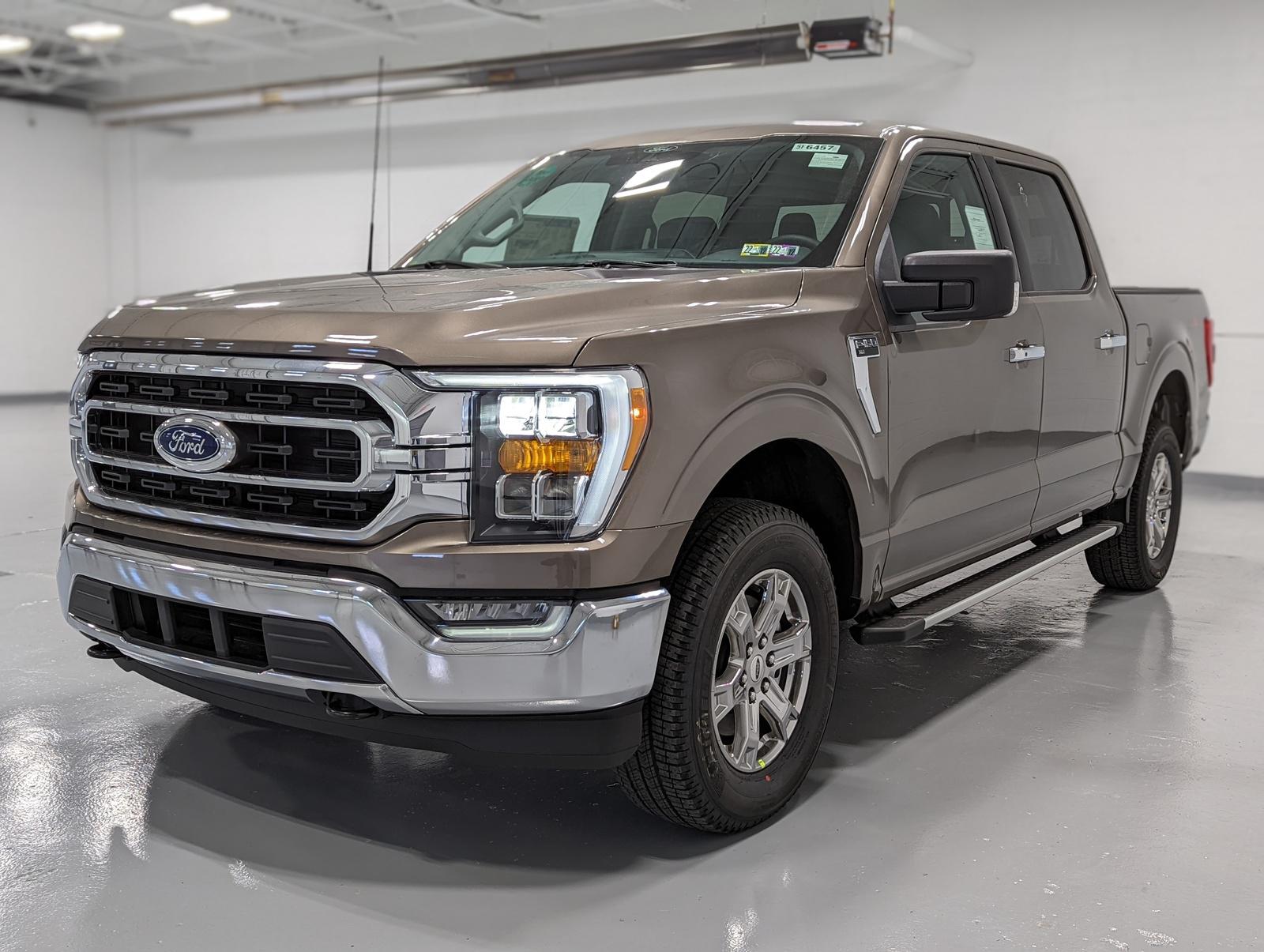 2022 Ford F 150 XLT 4WD Super Crew in Stone Grey.