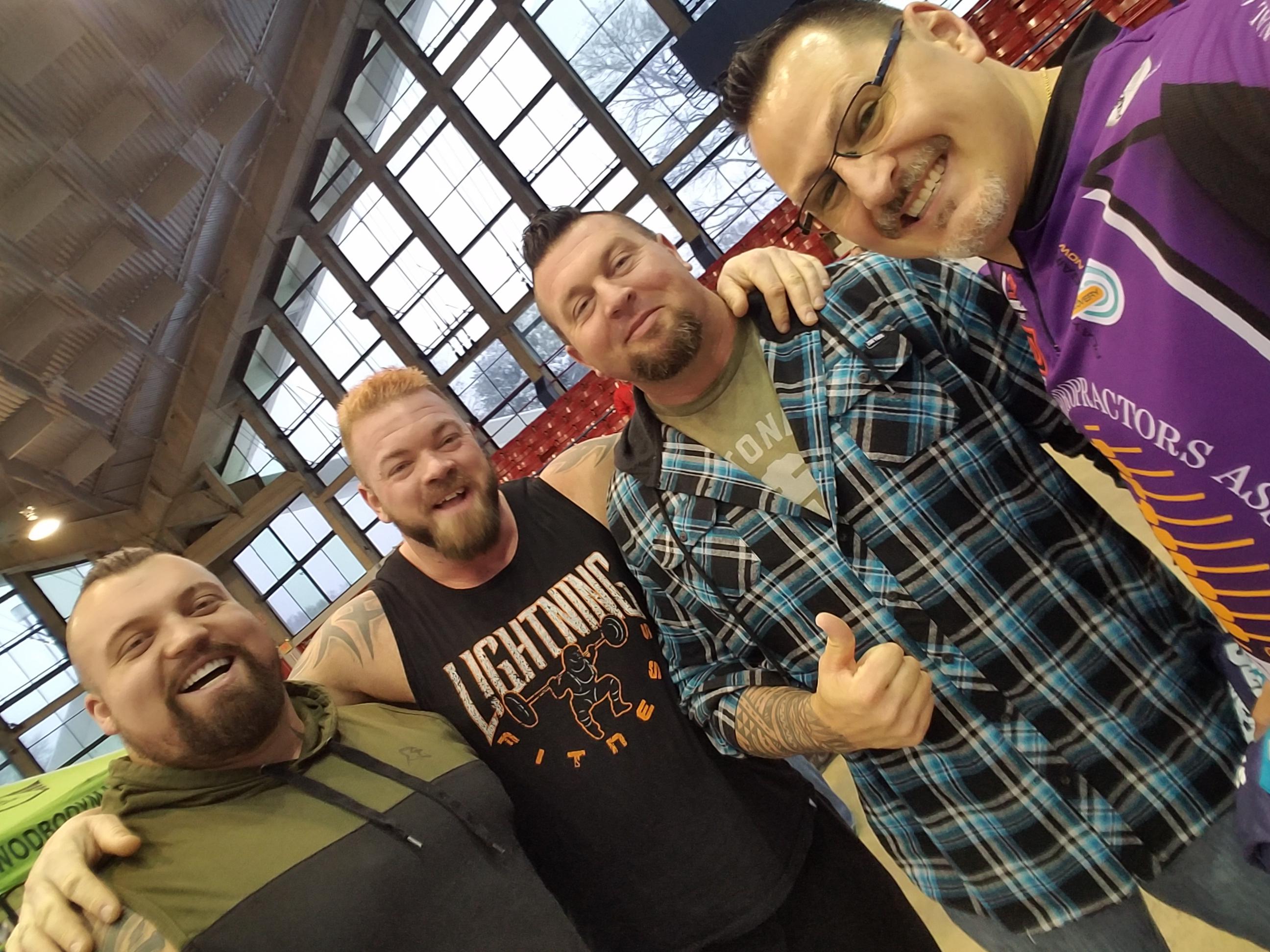 Dr. McDougle is presented here with some of the strongest men in the world!