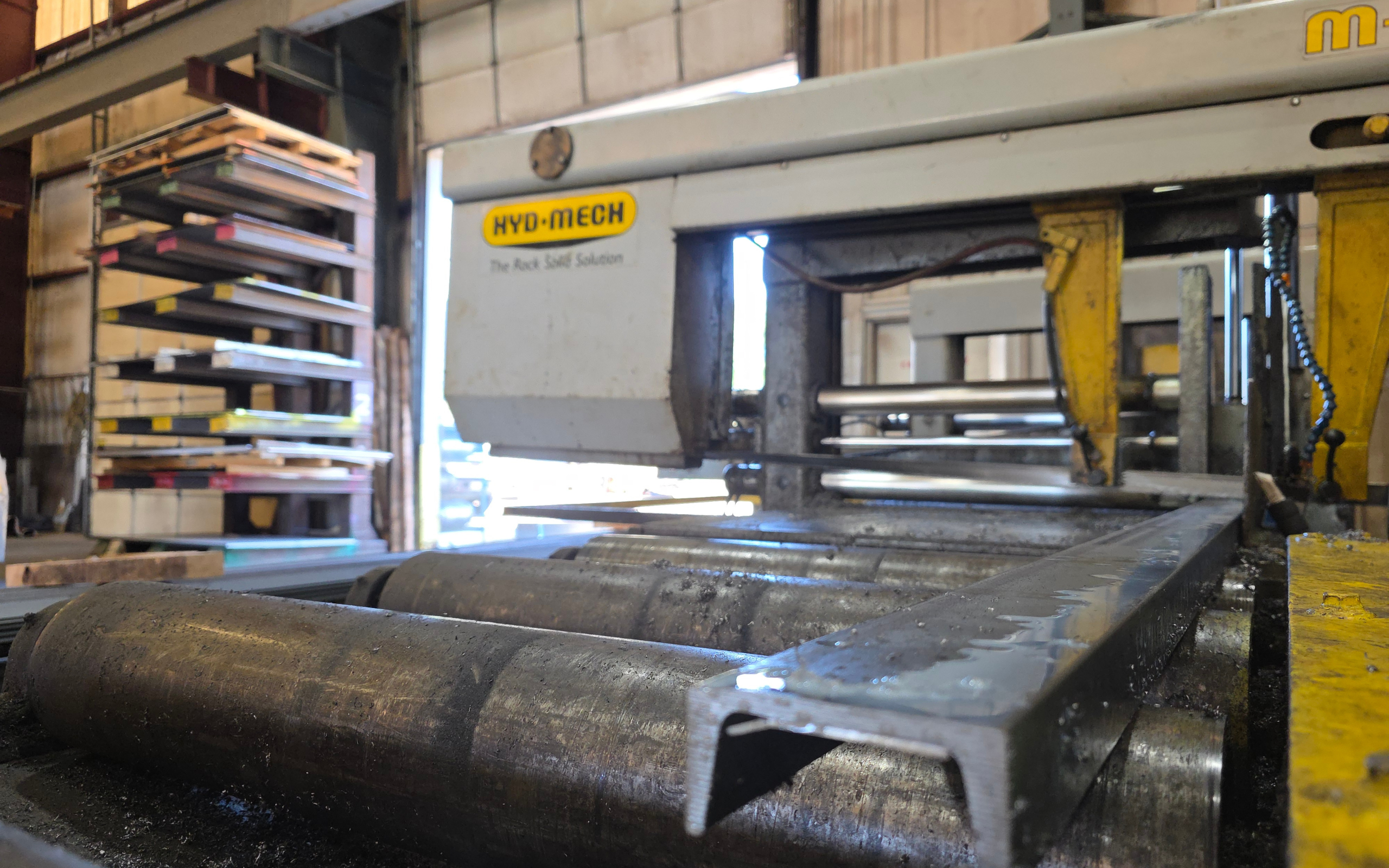 Automated CNC steel processing system at Ozark Mountain Steel, used for cutting, drilling, and preparing structural steel components with precision. This advanced equipment supports efficient fabrication for commercial, agricultural, and custom steel building projects.