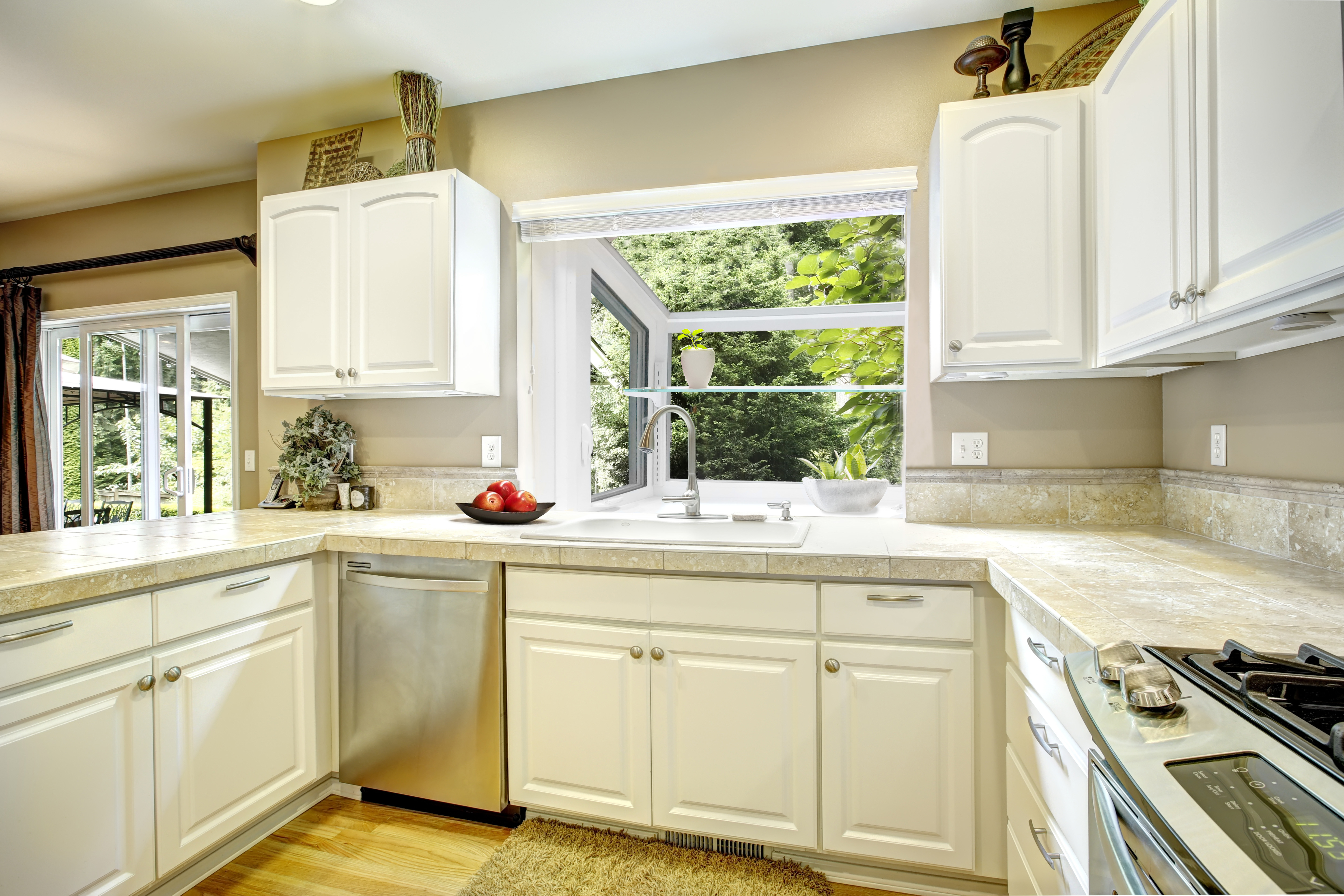 Brighten up your kitchen with the EcoTek 1200 - 2200 Series Garden Window, designed to maximize natural light and create a vibrant space perfect for plants or decorative accents. Its open design brings the outdoors in, enhancing the aesthetic appeal and functionality of any kitchen setting.