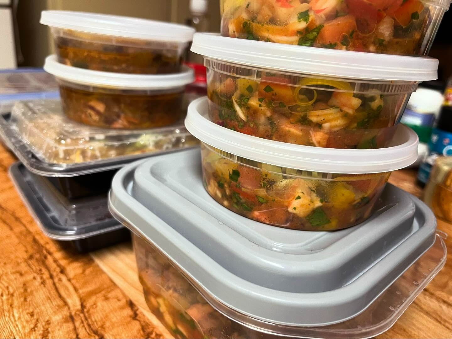 A variety of freshly prepared, chef-crafted meals packed and ready for delivery, showcasing Chef Joe’s personalized meal prep service. Neatly stacked containers reveal colorful, nutrient-rich dishes featuring fresh vegetables, herbs, and flavorful proteins. Designed for clients seeking healthy, convenient, and professionally prepared meals, this image reflects Chef Joe's commitment to making home dining both simple and satisfying throughout Phoenix, Arizona.