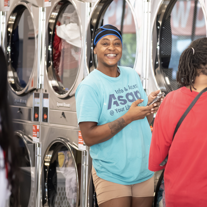 Speed Queen Laundry customer with a commercial washing machine. 