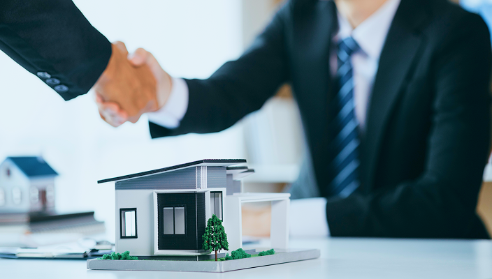 Business people shaking hands.