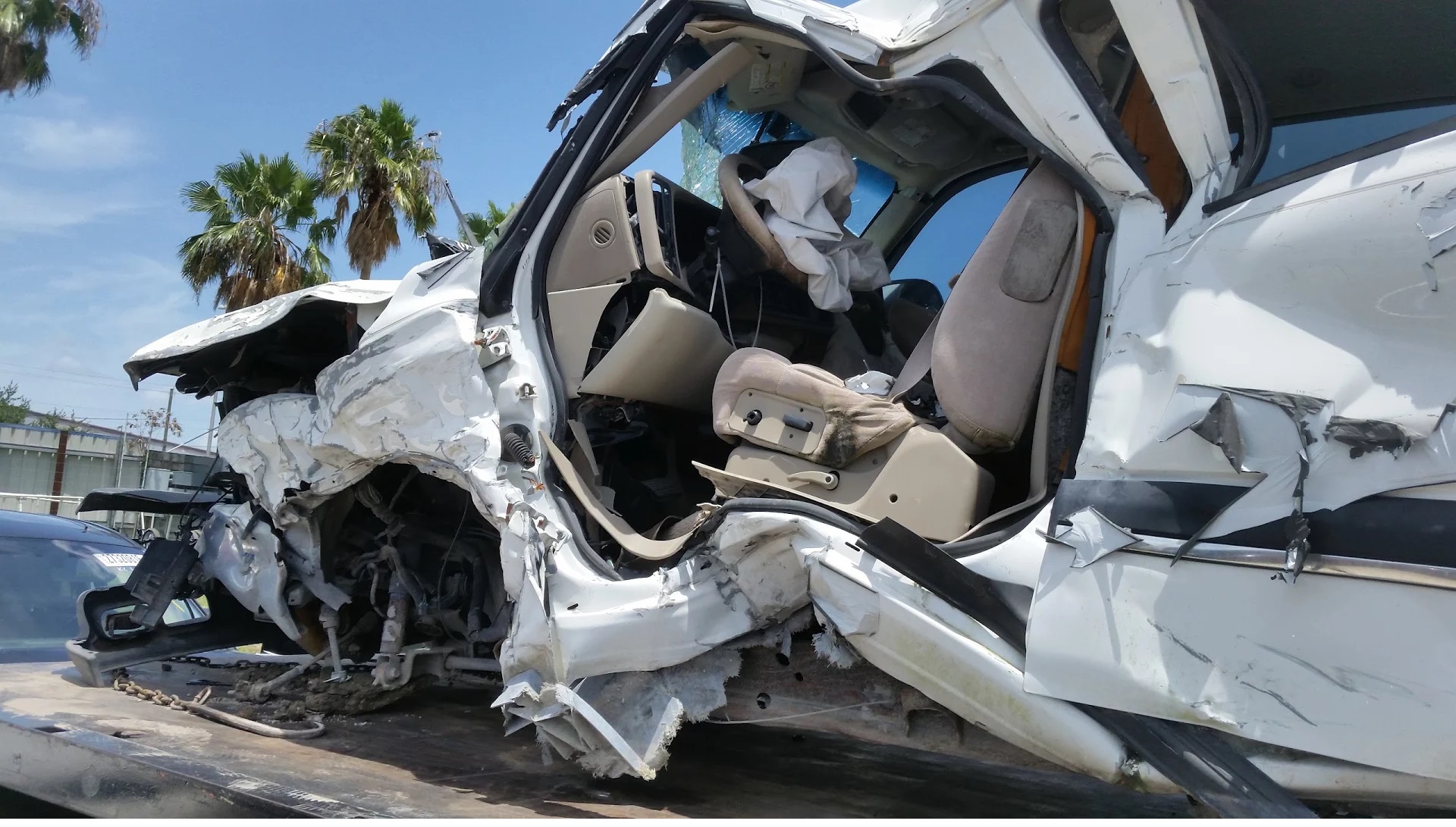 Suburban post accident, unrecognizable Florida Junk Cars Tampa (813)833-9273