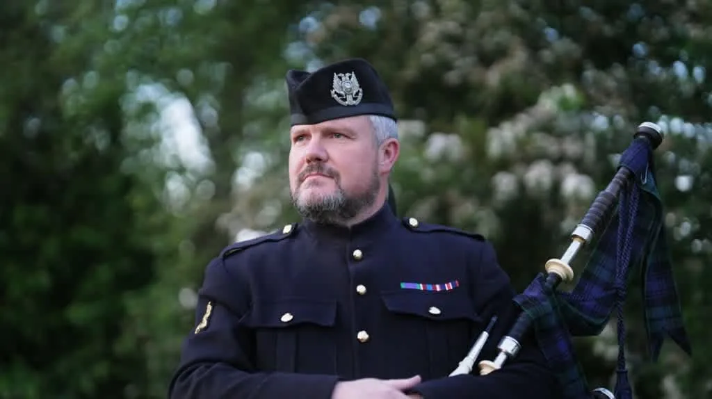 Images Andrew Paton Highland Bagpiper